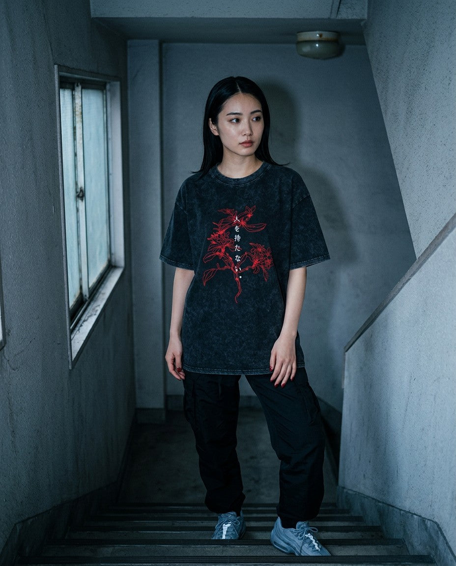 Woman wearing the Higanbana Washed Tee, night street lifestyle photo