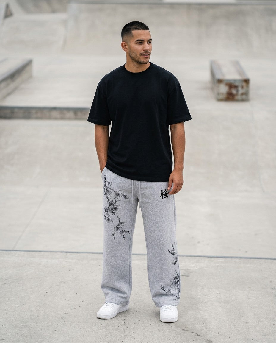 Man wearing the Sakura Ink Sweatpants, lifestyle photo